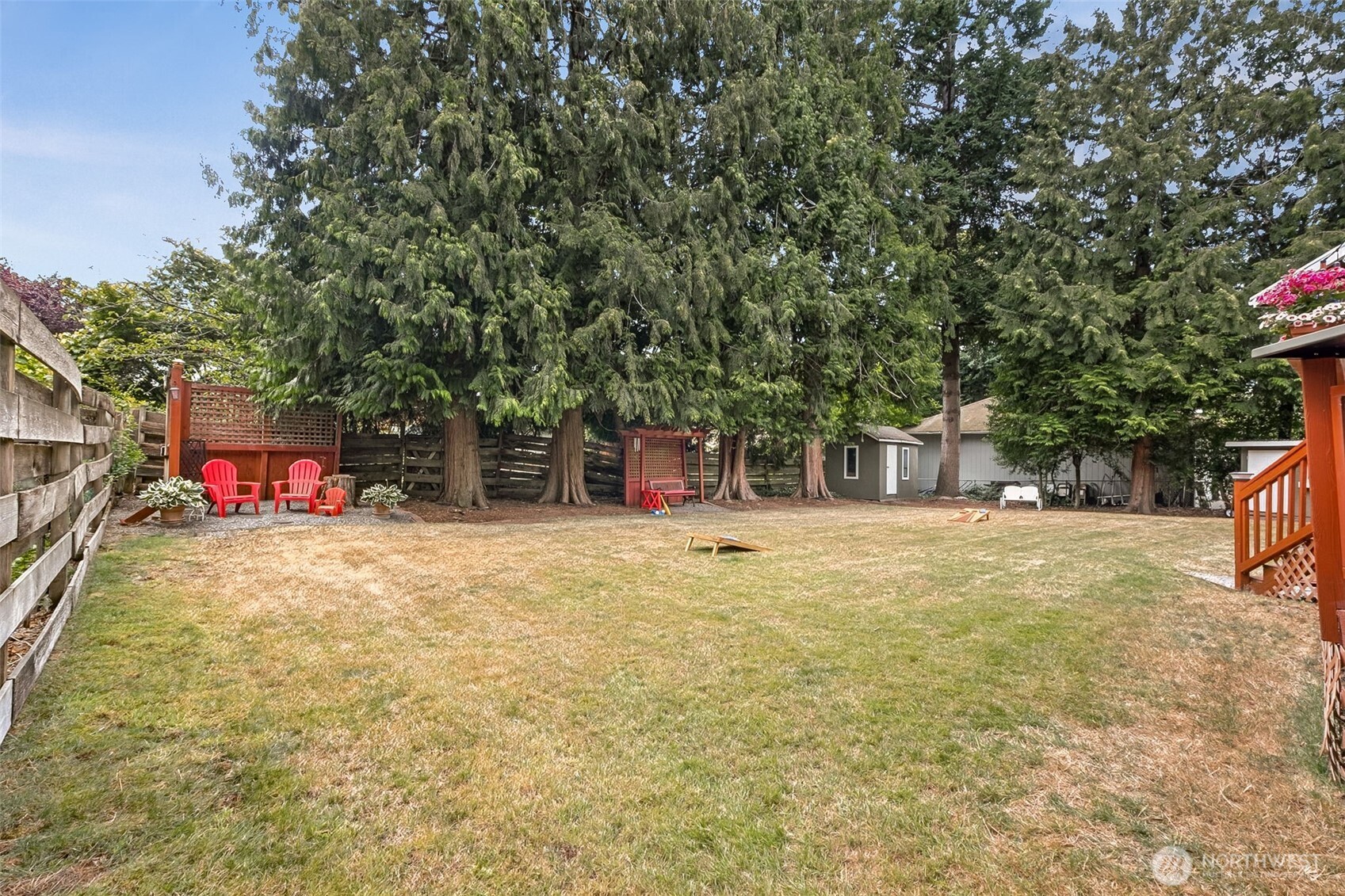 20623 98th Place South Kent, WA 98031 - Photo 27 of 37 a backyard of a house with table and chairs