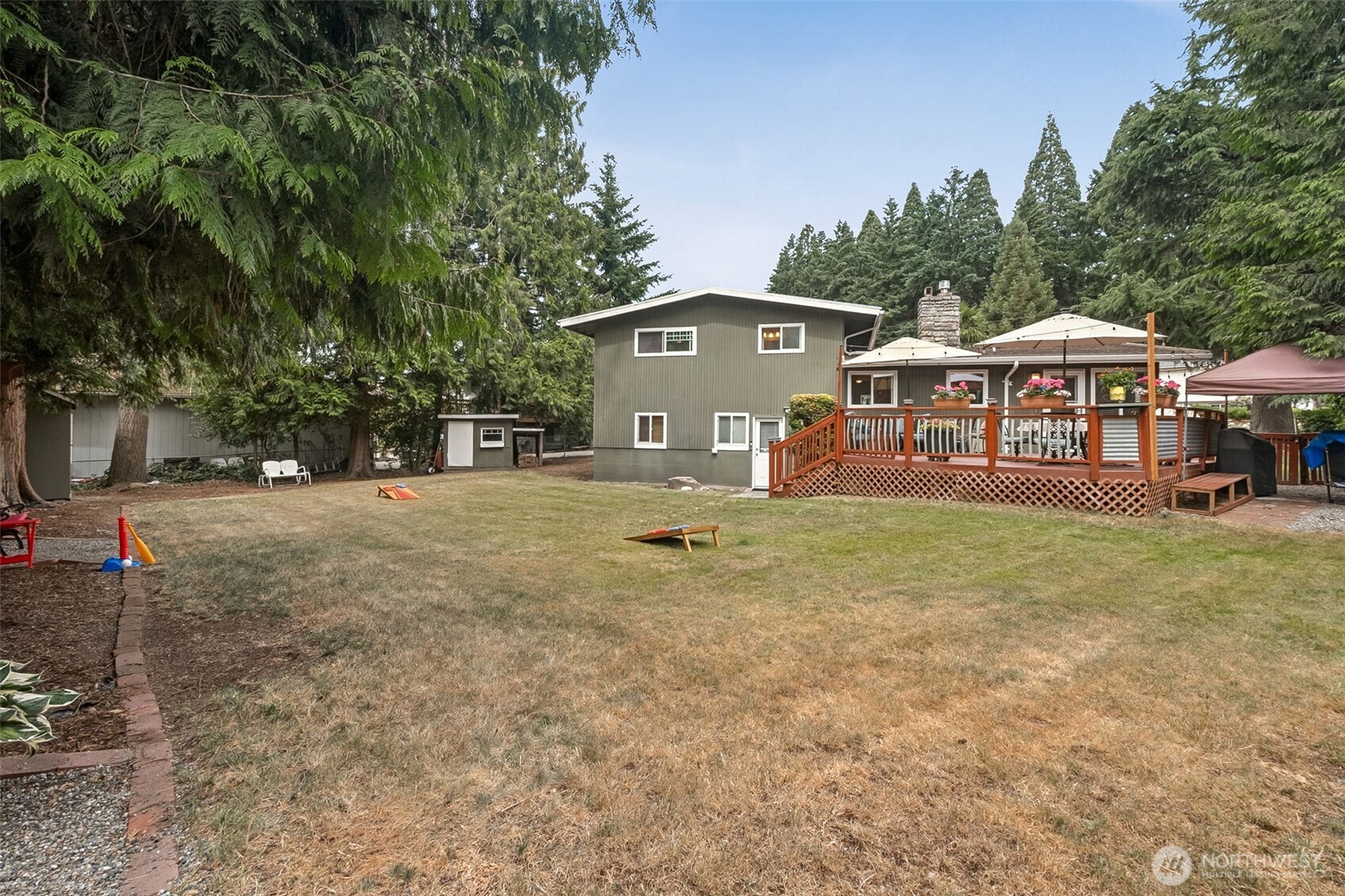 20623 98th Place South Kent, WA 98031 - Photo 28 of 37 a view of a house with a yard