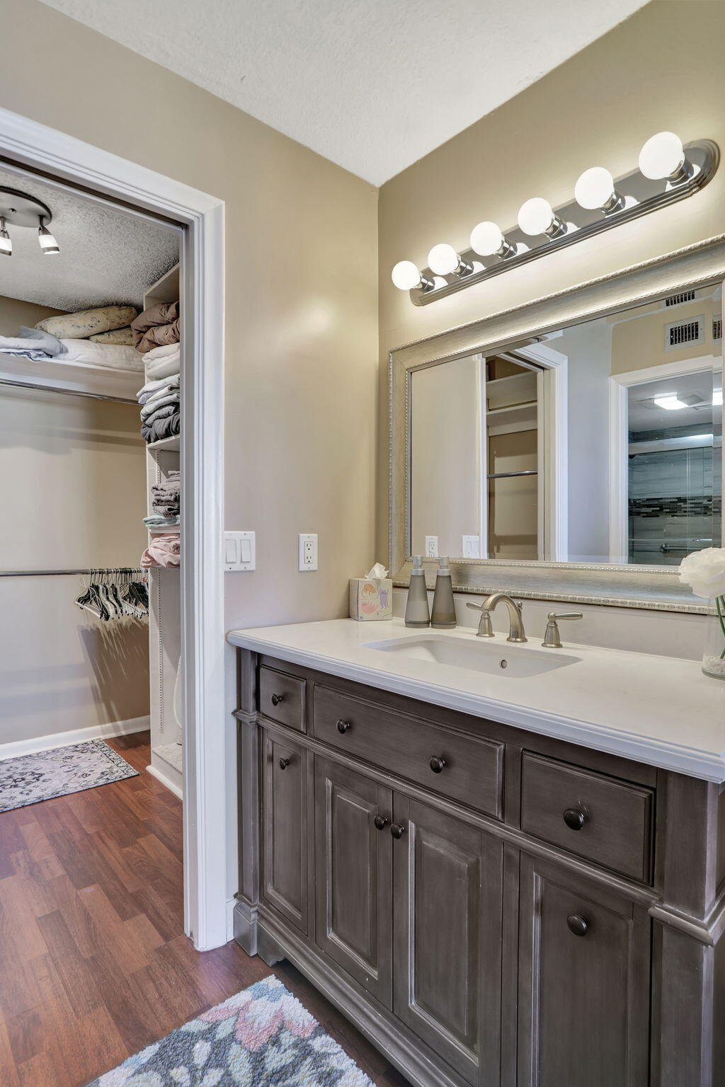 4 Royal Palm Way, Unit 6020 Boca Raton, FL 33432 - Photo 20 of 41 a bathroom with a double vanity sink and a mirror