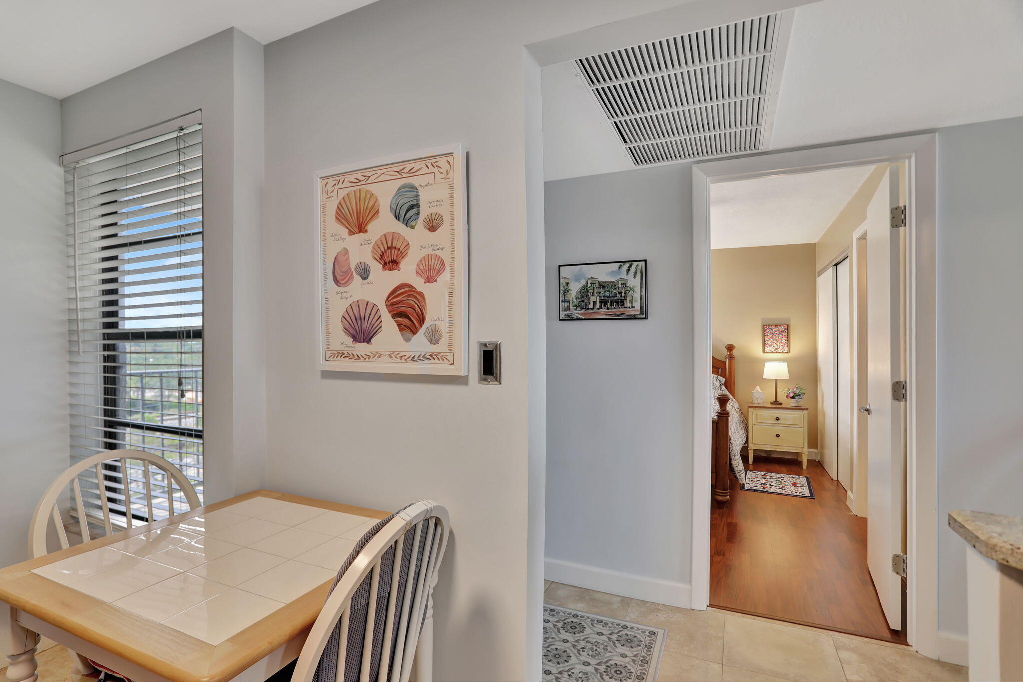 4 Royal Palm Way, Unit 6020 Boca Raton, FL 33432 - Photo 6 of 41 a view of a hallway to a livingroom with furniture