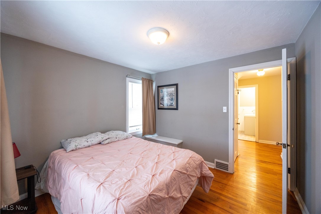 1937 Staunton Road Cleveland, OH 44118 - Photo 18 of 31 Bedroom with light wood finished floors and baseboards
