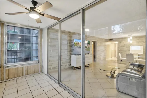 a bathroom with a shower and a sink