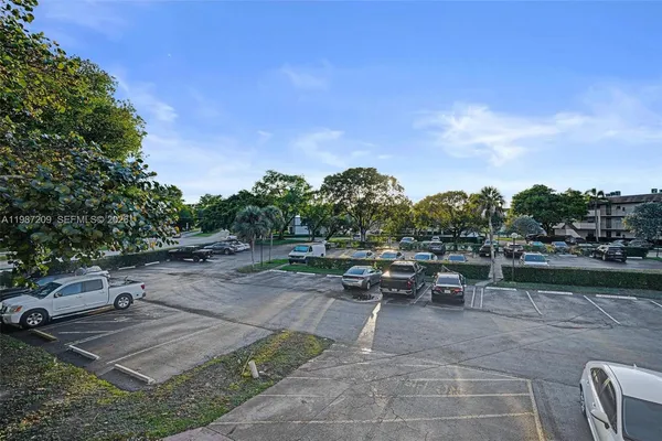 a view of a patio with swimming pool