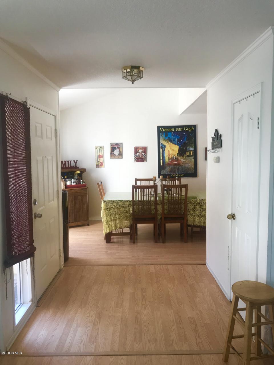 500 Percy Street, Unit 54 Oxnard, CA 93033 - Photo 6 of 9 a view of a livingroom with furniture and a flat screen tv