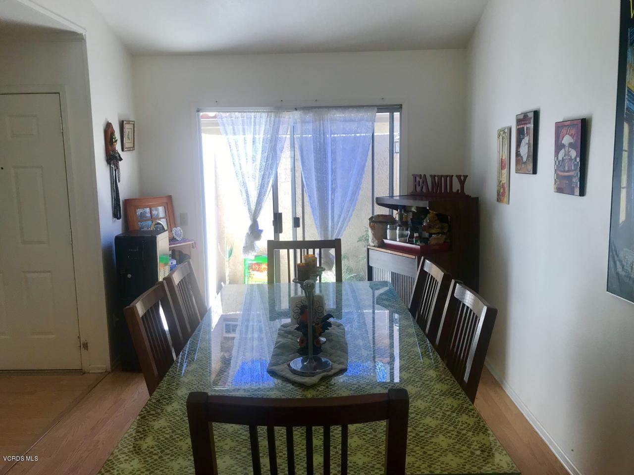 500 Percy Street, Unit 54 Oxnard, CA 93033 - Photo 8 of 9 a view of a workspace with furniture and a window