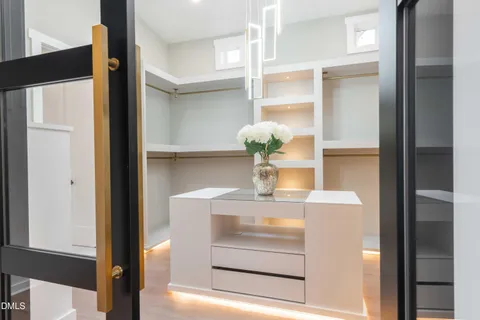 a view of an empty walk in closet