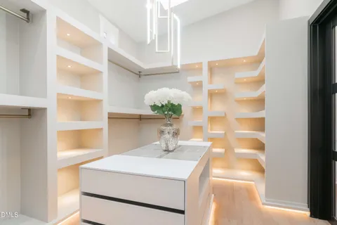 a bathroom with a sink toilet and a mirror