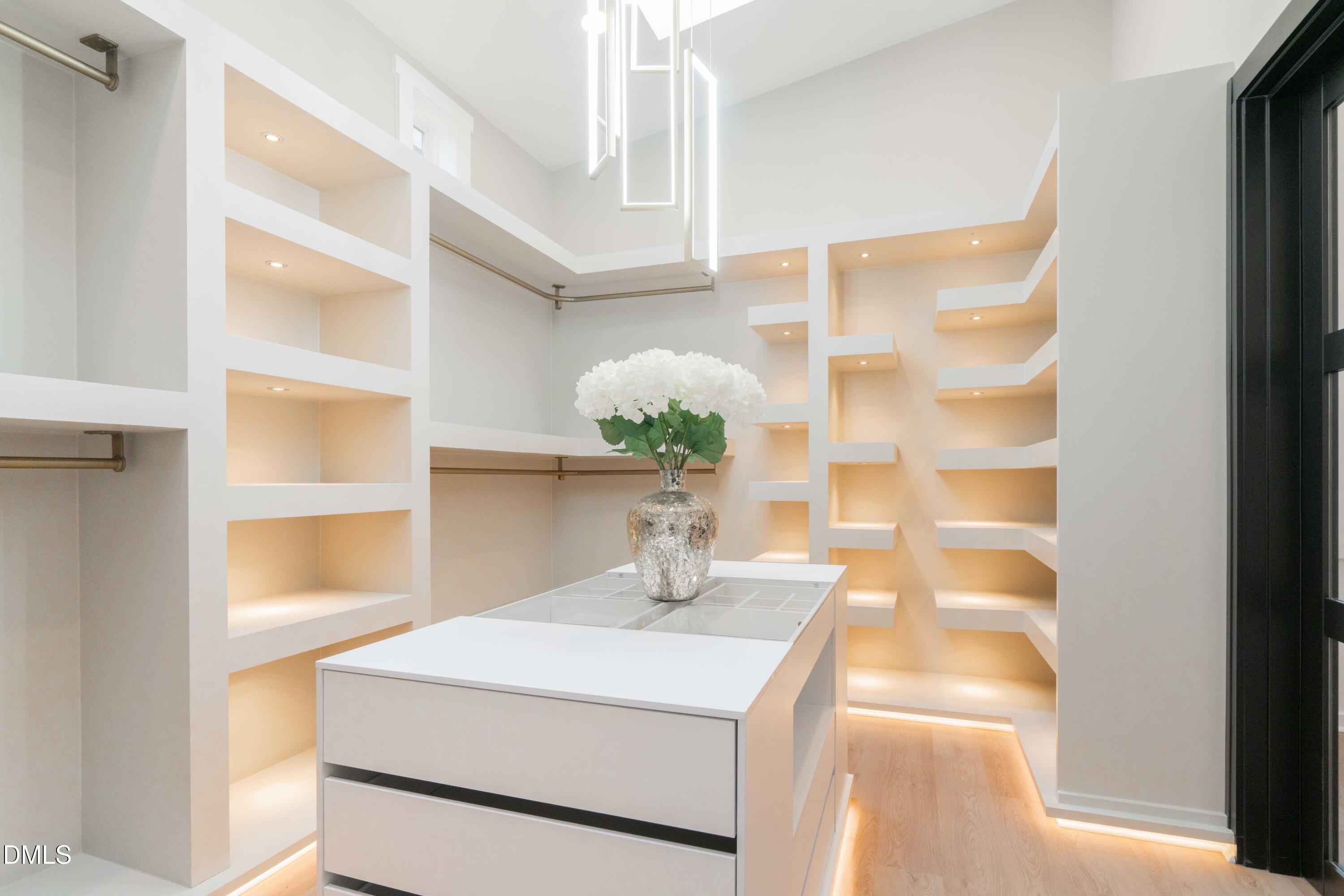 721 Currituck Drive Raleigh, NC 27609 - Photo 32 of 81 a bathroom with a sink and a mirror