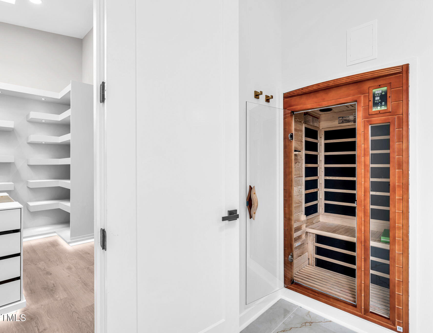 721 Currituck Drive Raleigh, NC 27609 - Photo 40 of 81 a view of walk in closet with clothes