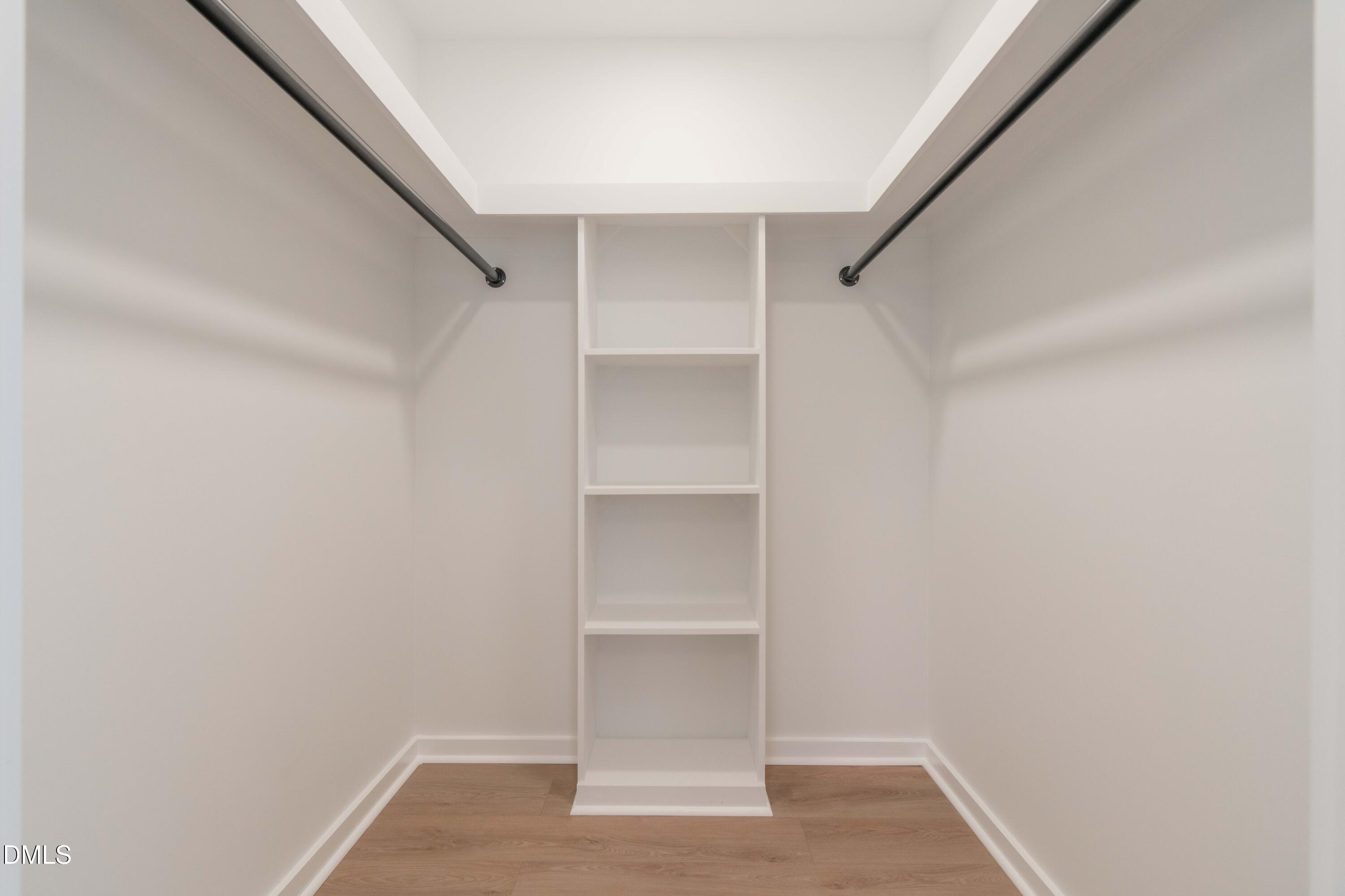 721 Currituck Drive Raleigh, NC 27609 - Photo 44 of 81 a view of an empty walk in closet