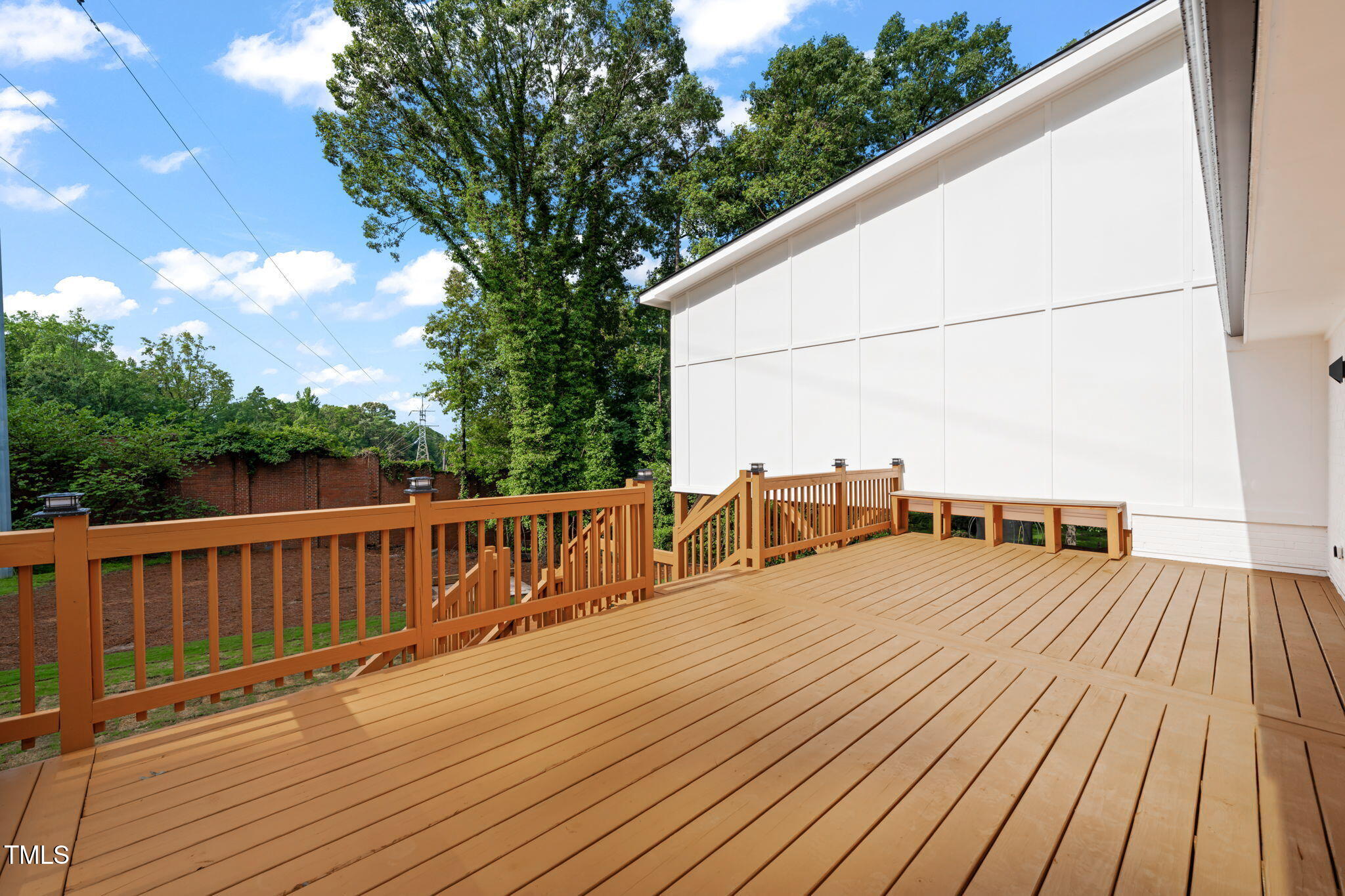 721 Currituck Drive Raleigh, NC 27609 - Photo 77 of 81 a view of a balcony with wooden floor and fence