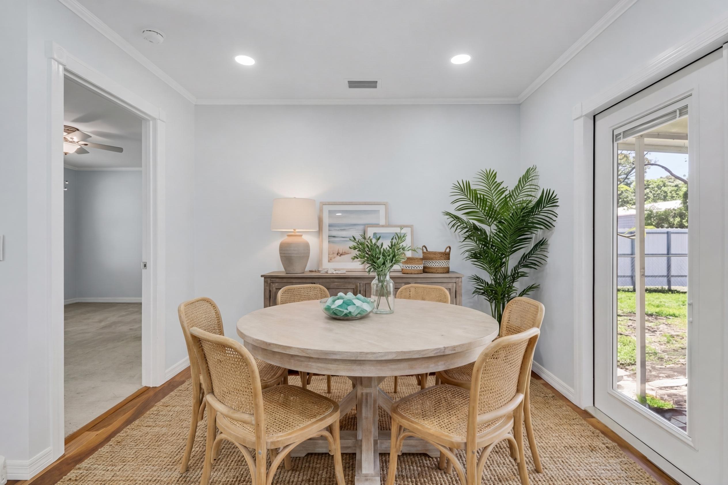 5909 Seagrape Drive Fort Pierce, FL 34982 - Photo 12 of 27 a view of a dining room with furniture window and outside view