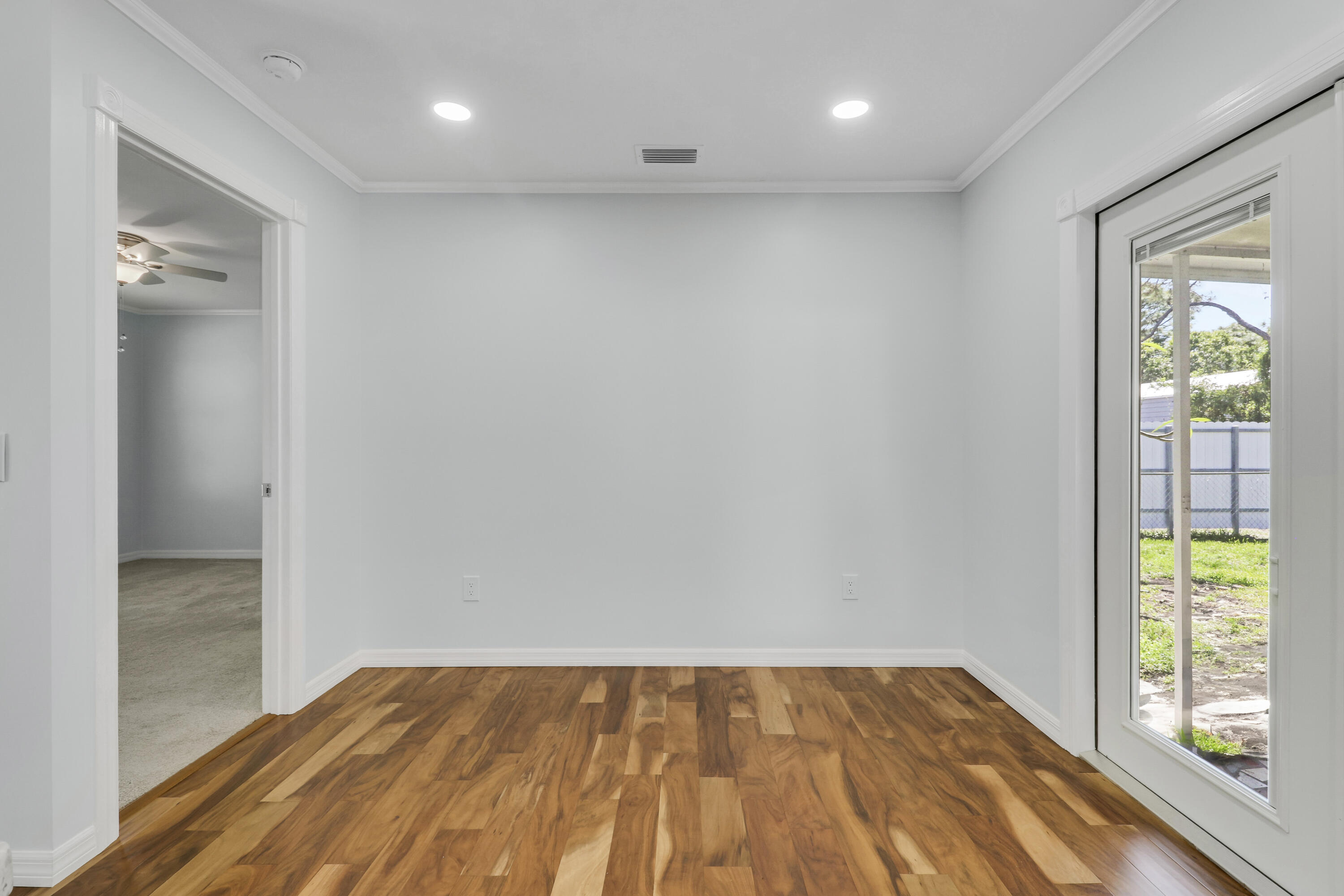 5909 Seagrape Drive Fort Pierce, FL 34982 - Photo 13 of 27 a view of an empty room and window