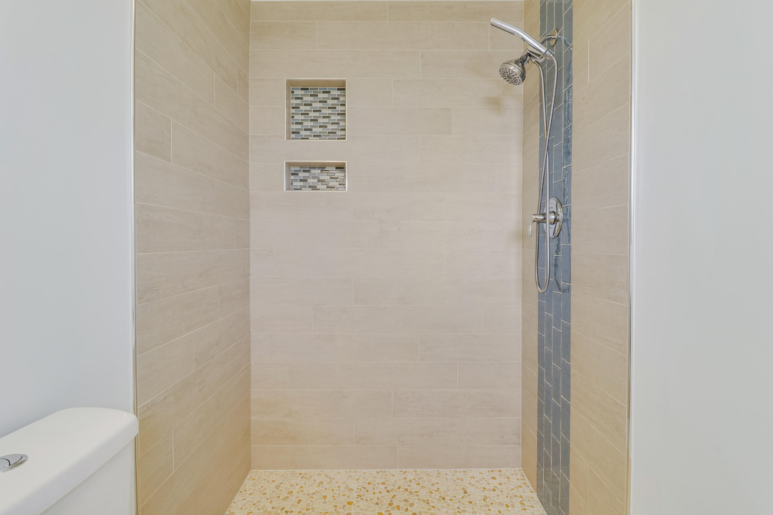5909 Seagrape Drive Fort Pierce, FL 34982 - Photo 17 of 27 a bathroom with a shower