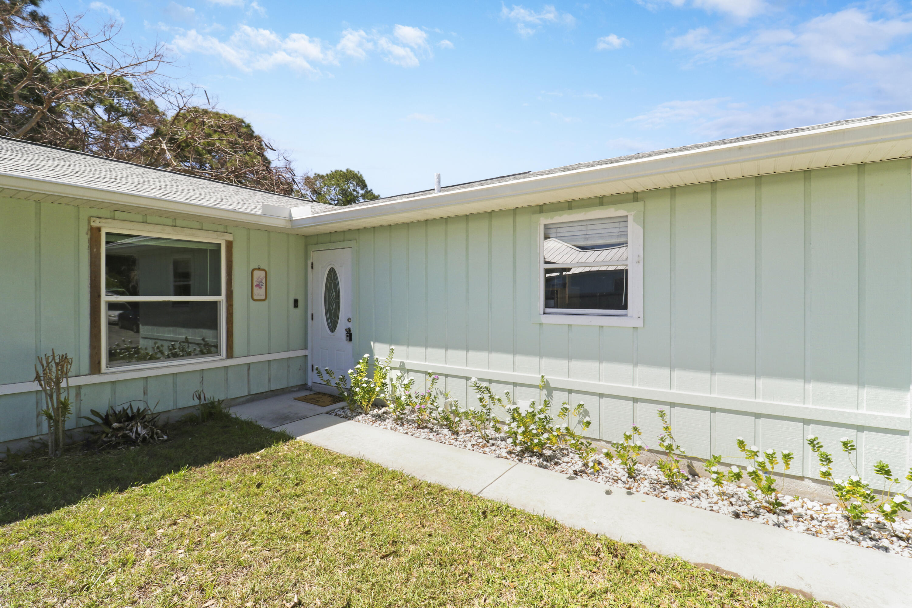 5909 Seagrape Drive Fort Pierce, FL 34982 - Photo 2 of 27 Front 3