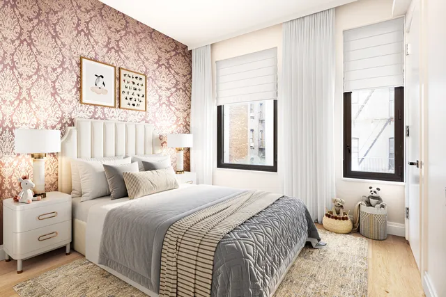 a bedroom with a bed and a couch