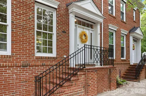 a view of a brick house with a window