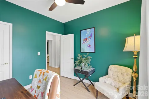 a bedroom with furniture and a bed