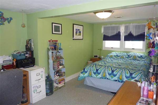 26 Leen Road Bourne, MA 02559 - Photo 16 of 19 a bedroom with a bed and a window