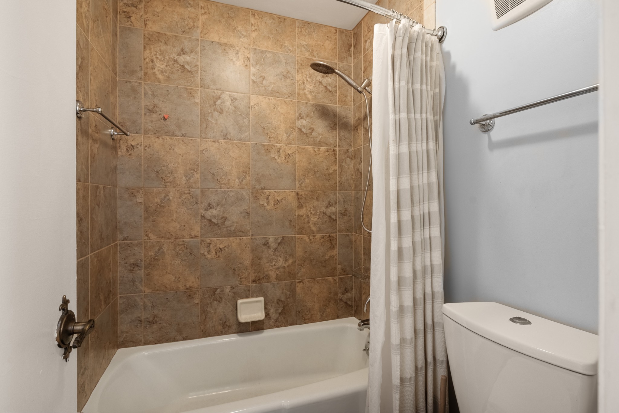 21 Vaughns Gap Road, Unit 23 Nashville, TN 37205 - Photo 15 of 25 a bathroom with a shower and a toilet