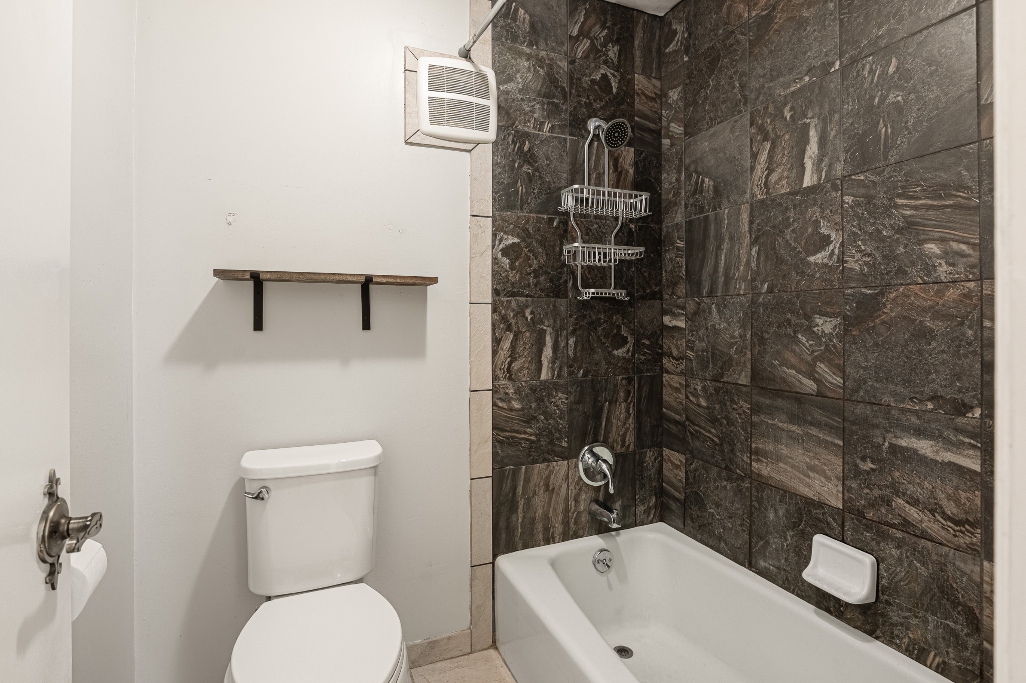 21 Vaughns Gap Road, Unit 23 Nashville, TN 37205 - Photo 23 of 25 a bathroom with a toilet and a shower