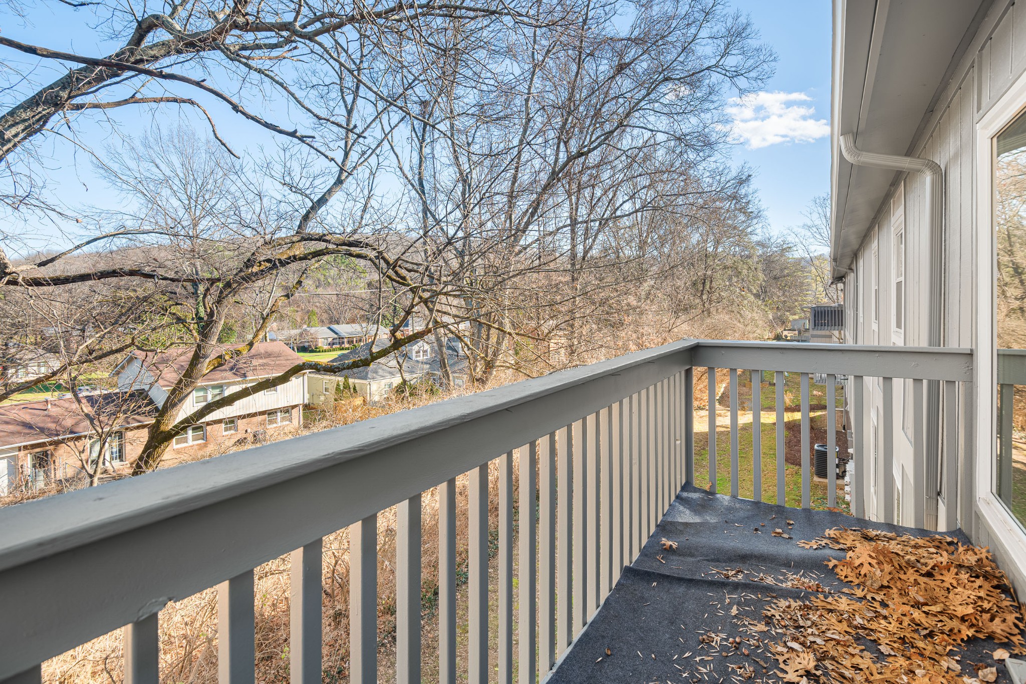 21 Vaughns Gap Road, Unit 23 Nashville, TN 37205 - Photo 25 of 25 a view of a wooden fence from a balcony