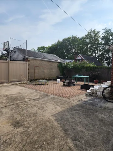 a front view of a house with garage