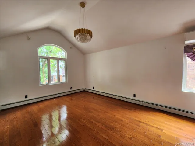 a view of room with window and ceiling fan