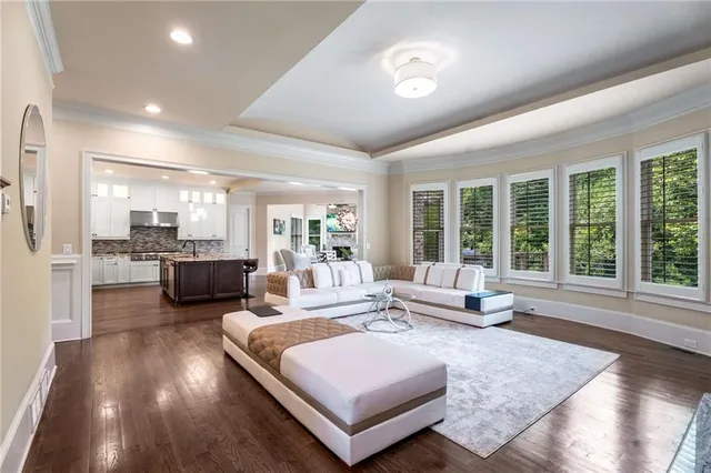 a view of a dining room with furniture window and wooden floor