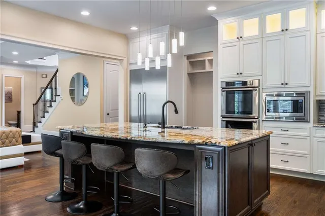 a living room with furniture fireplace and flat screen tv