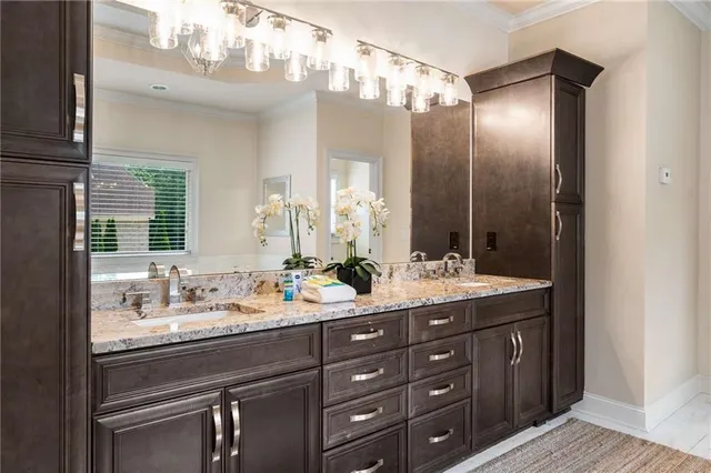 a front view of a house with a yard table and chairs
