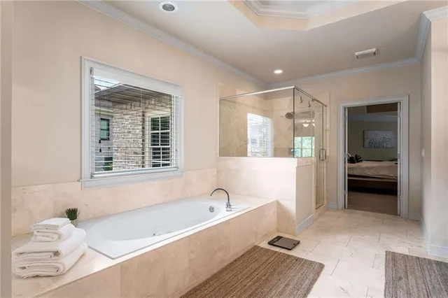 a view of a house with a swimming pool and a yard