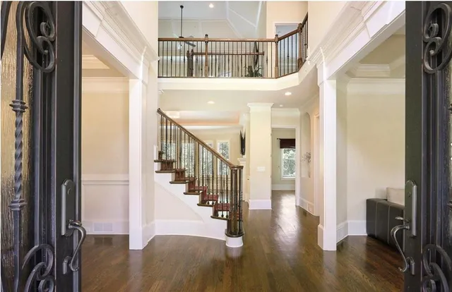 a living room with furniture fireplace and a flat screen tv