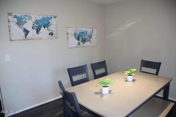 a spacious bedroom with a bed and window