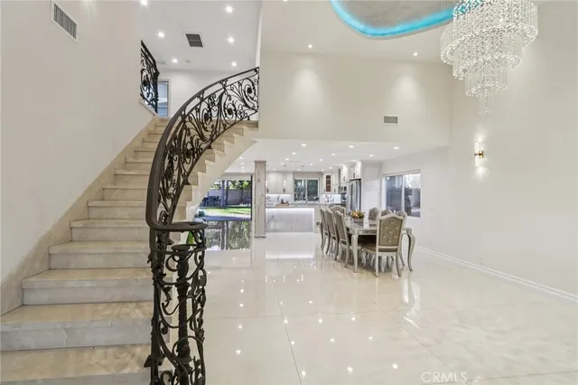 a dining room with furniture and a table