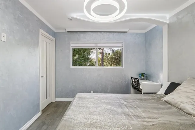 a view of washer and dryer with kitchen in the background