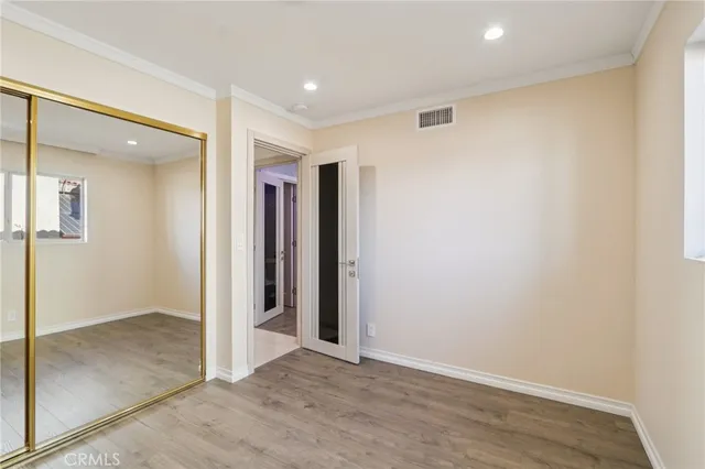 a view of a house with a yard patio and furniture