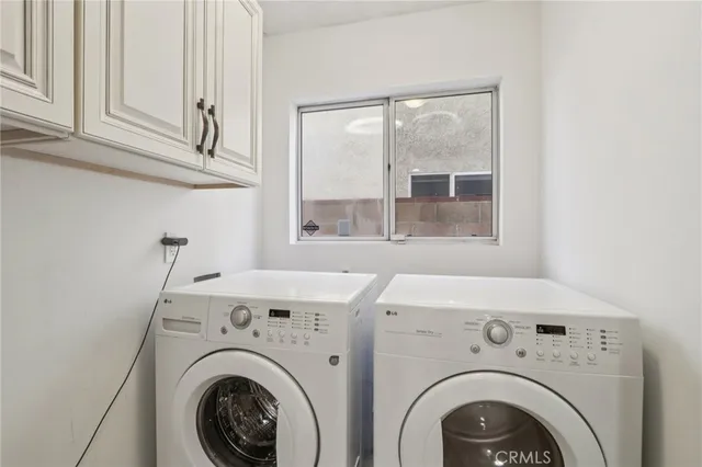 a aerial view of a house with a yard and garden