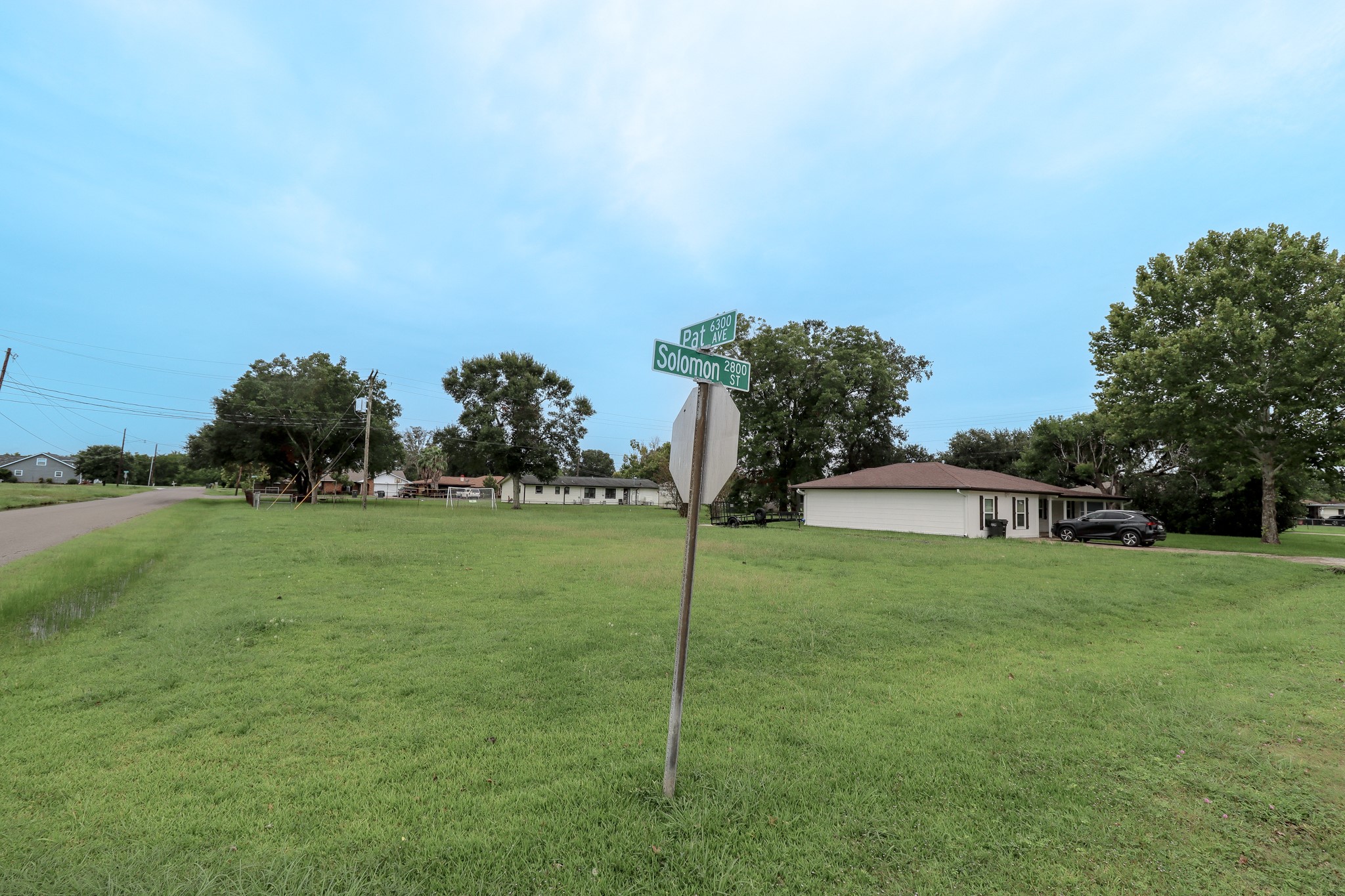 2895 Solomon Street Port Arthur, TX 77640 - Photo 4 of 7 a view of a field of grass and trees
