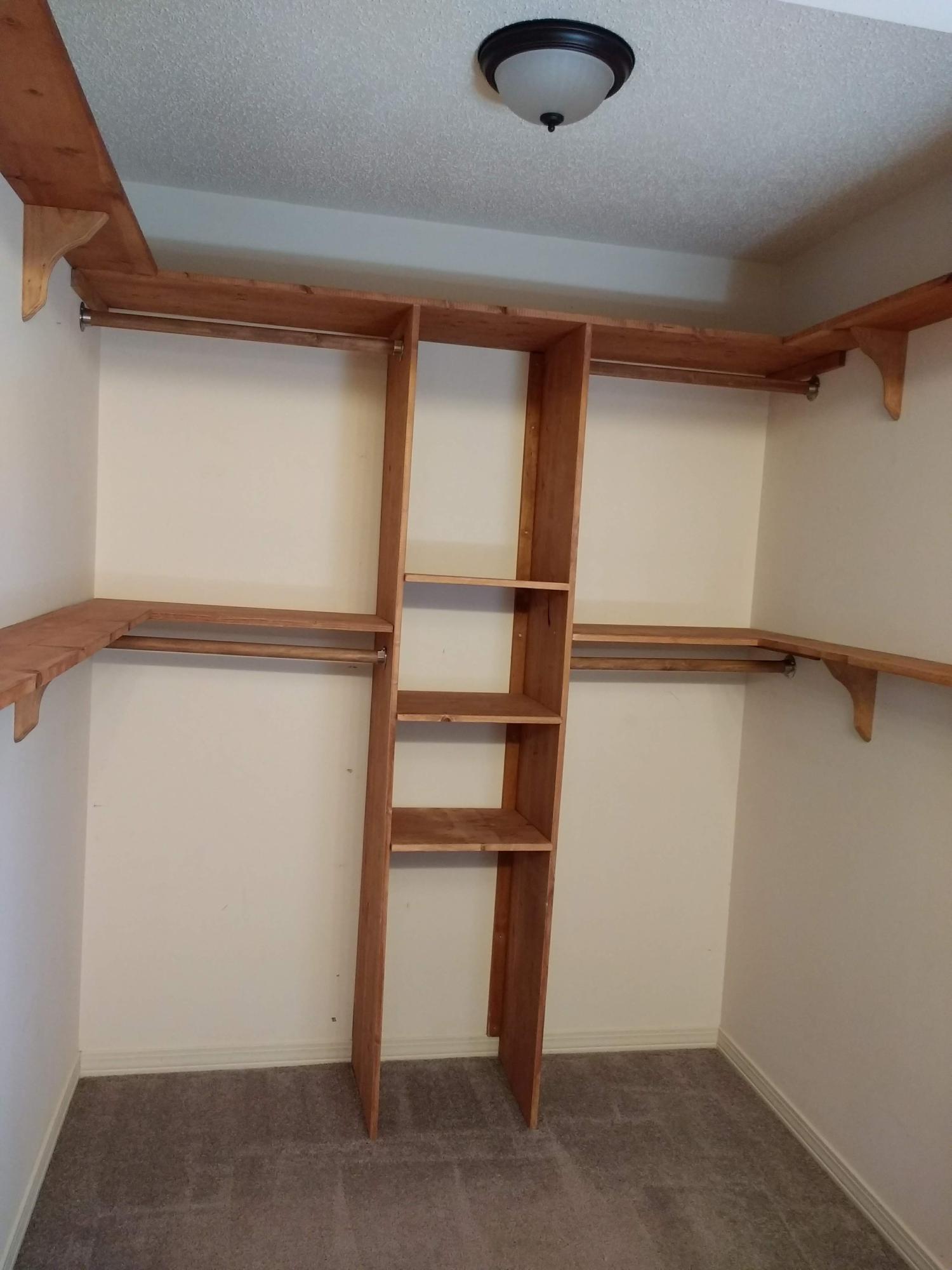 801 Cloverview Drive Crestview, FL 32536 - Photo 12 of 28 a view of storage and utility room with racks on the wall