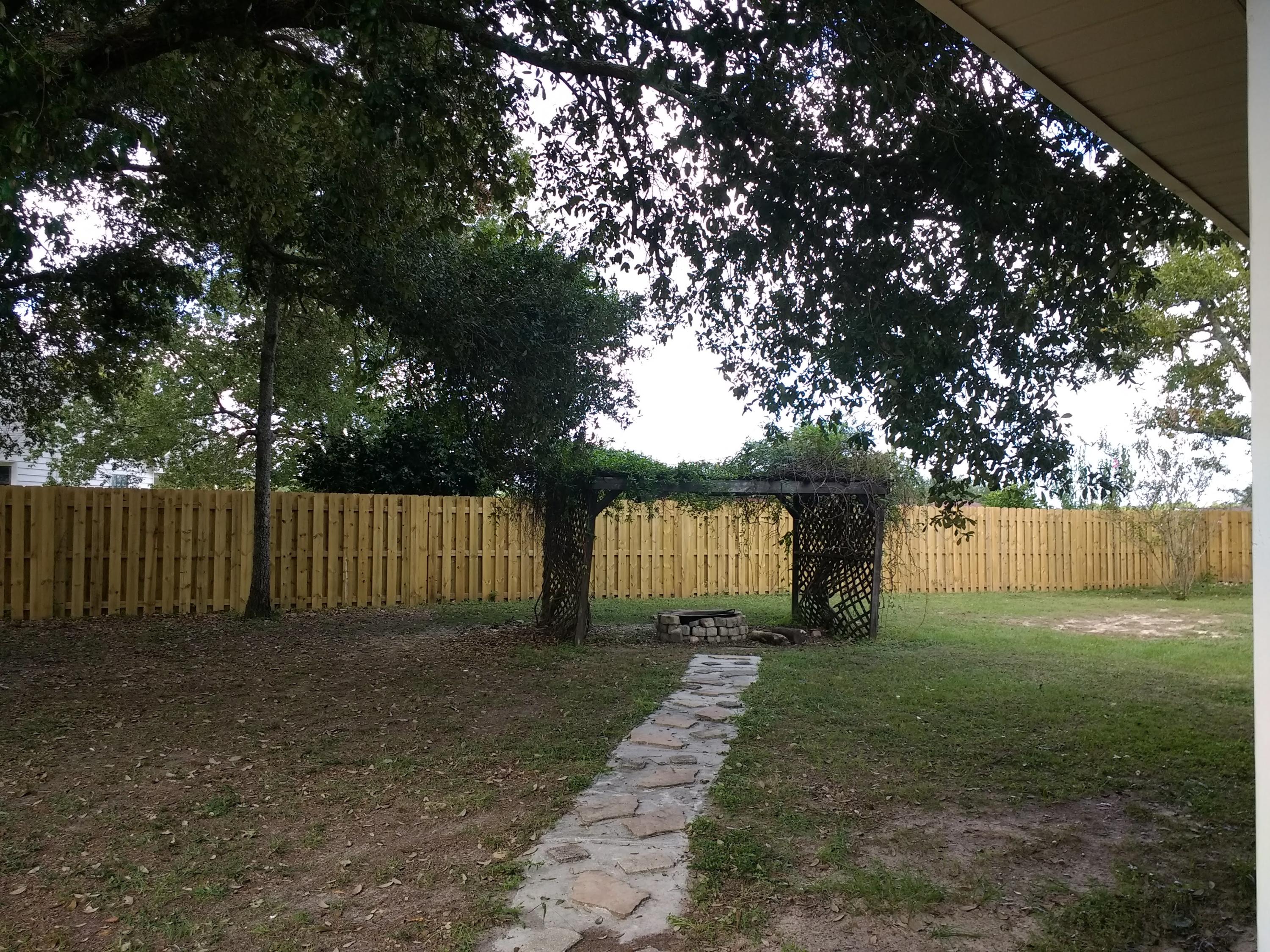 801 Cloverview Drive Crestview, FL 32536 - Photo 25 of 28 a view of backyard with green space