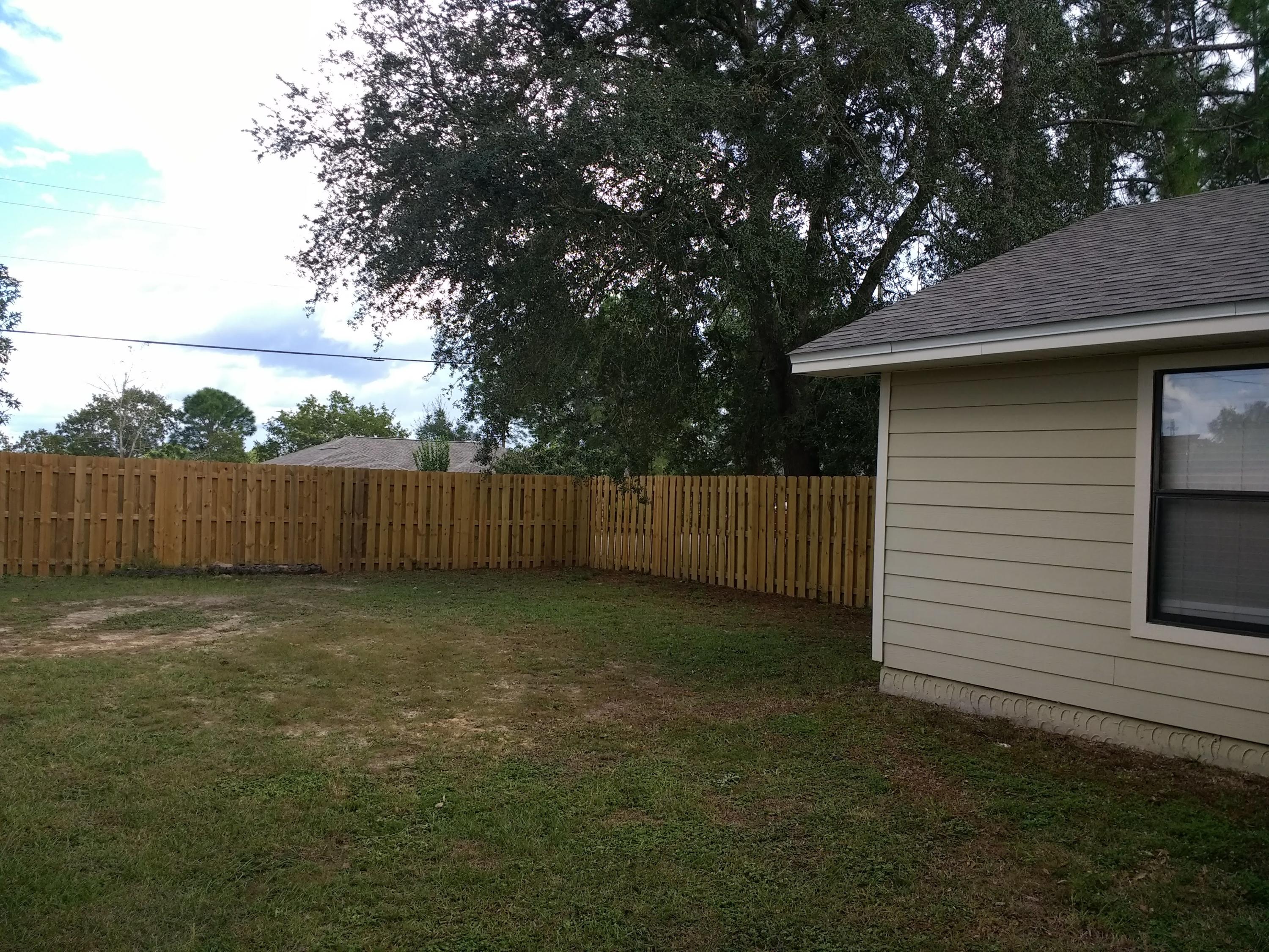 801 Cloverview Drive Crestview, FL 32536 - Photo 27 of 28 a view of a backyard