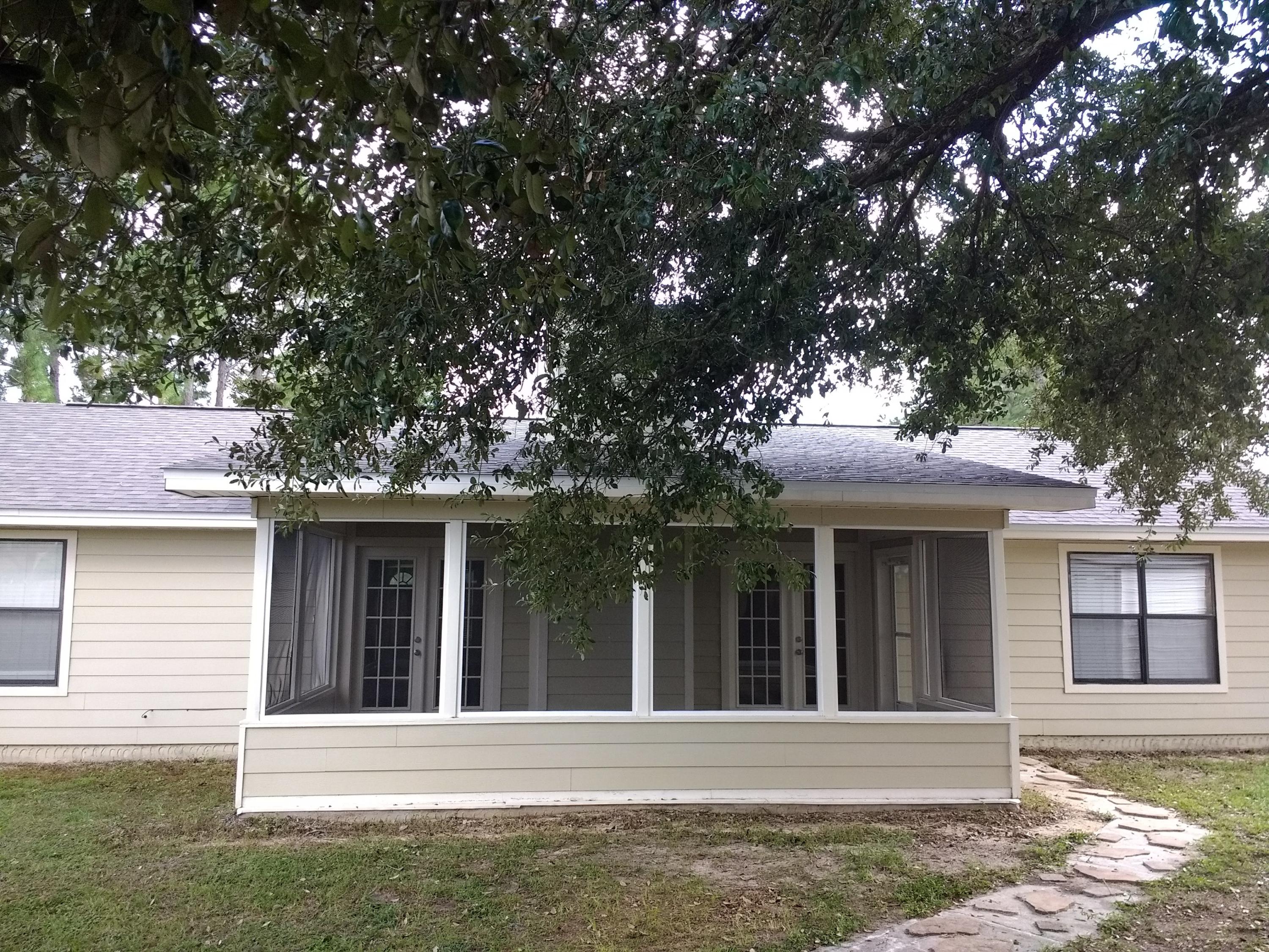801 Cloverview Drive Crestview, FL 32536 - Photo 28 of 28 front view of a house with a yard