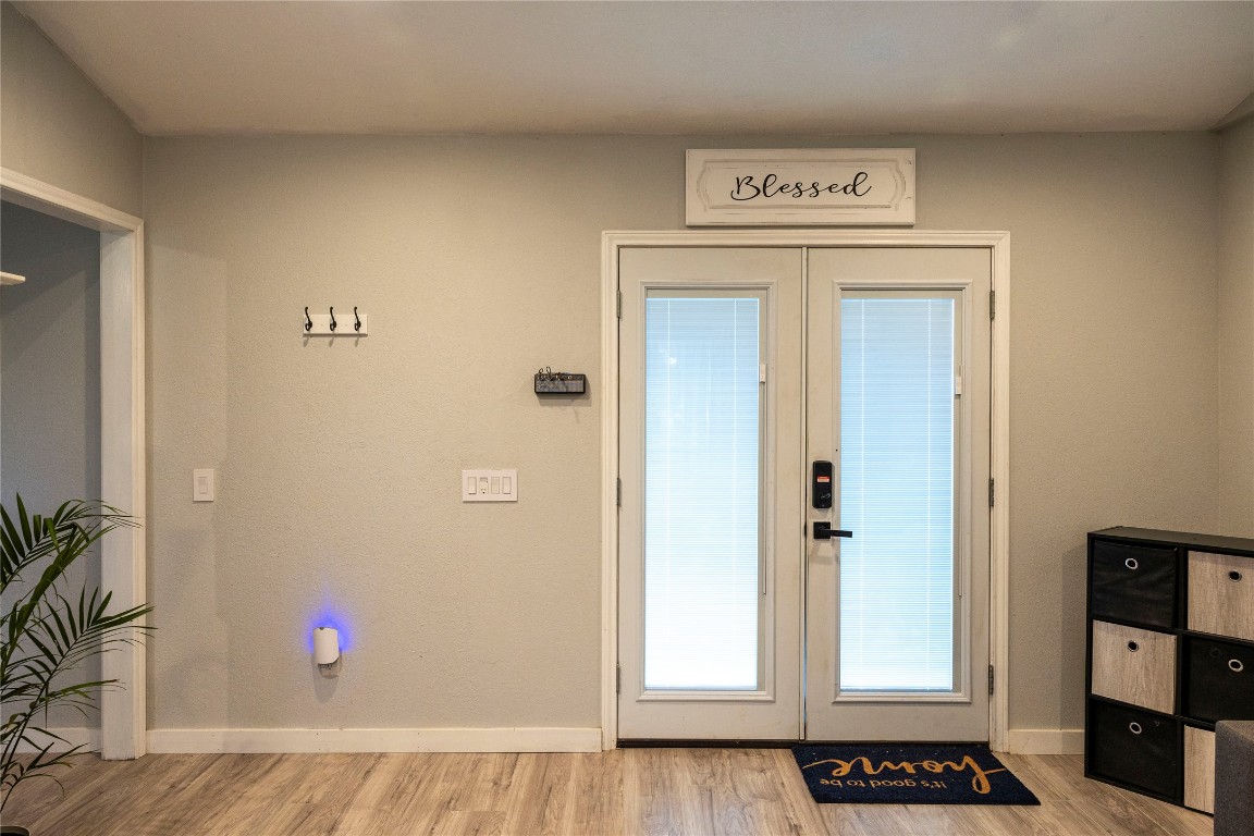 1014 Private Road 4041 Dime Box, TX 77853 - Photo 22 of 30 a view of front door with wooden floor