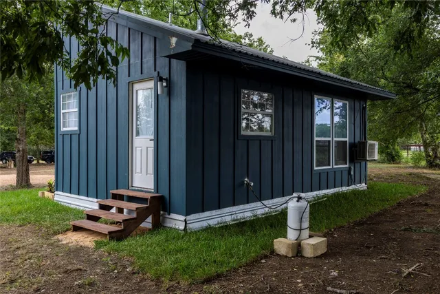 a view of a backyard with a garden
