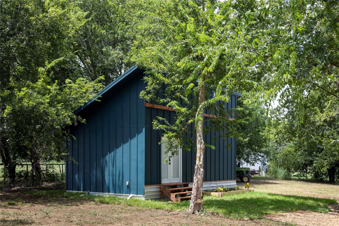 1014 Private Road 4041 Dime Box, TX 77853 - Photo 25 of 30 a backyard of a house with lots of green space