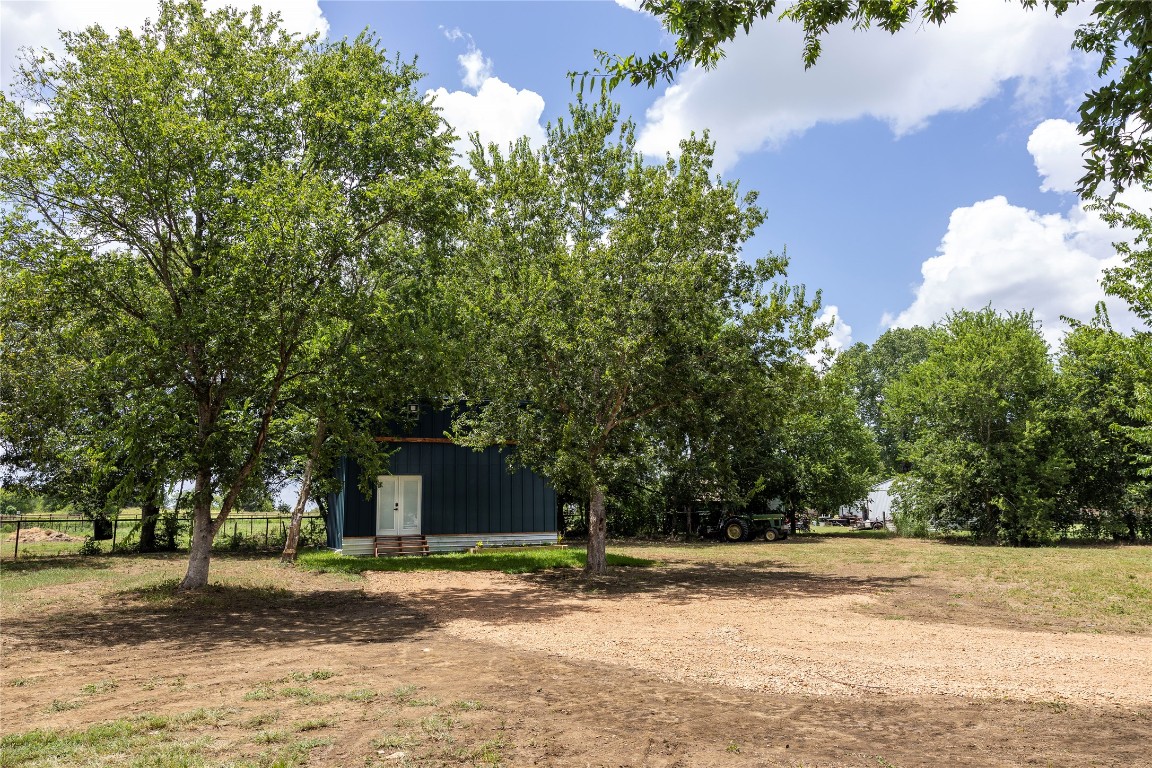 1014 Private Road 4041 Dime Box, TX 77853 - Photo 26 of 30 a view of a yard with a house