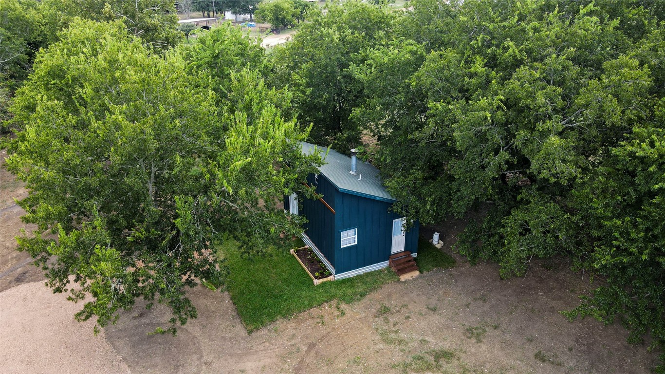 1014 Private Road 4041 Dime Box, TX 77853 - Photo 28 of 30 a view of a house with a yard and tree