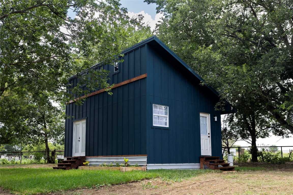 1014 Private Road 4041 Dime Box, TX 77853 - Photo 6 of 30 a view of a house with a yard