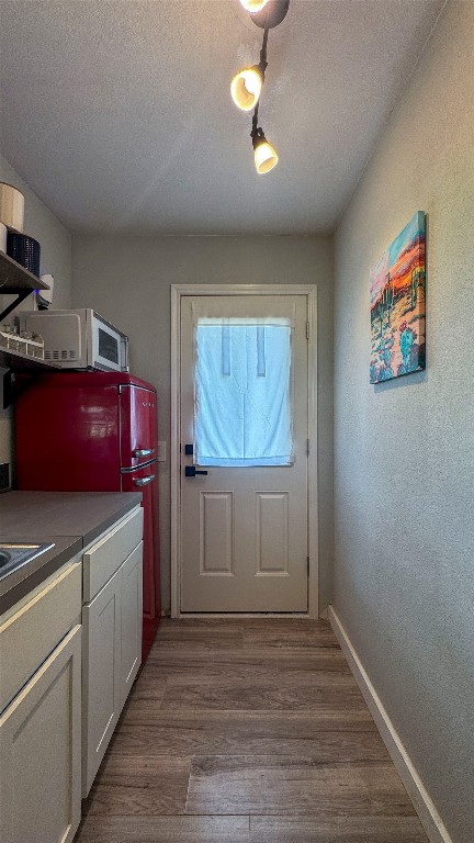1014 Private Road 4041 Dime Box, TX 77853 - Photo 10 of 30 a view of cabinets and wooden floor